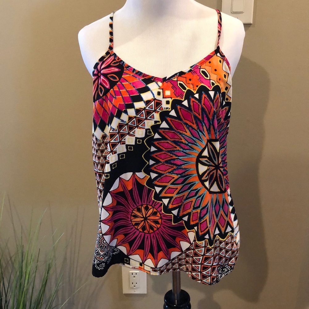 Fun print tank top with criss cross back.